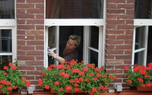 a man cleaning a window